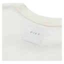 Camiseta Oakley x Piet Foil Nano Logo Branco Osso